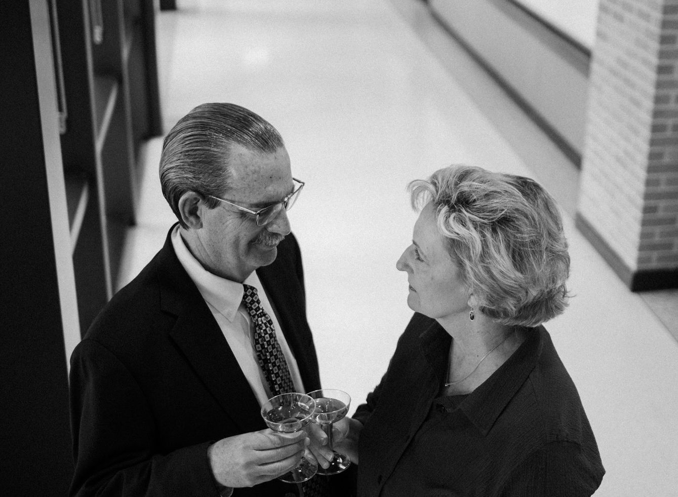 Black and white image of Tom and Dr. Ann Reber from the view of a security camera