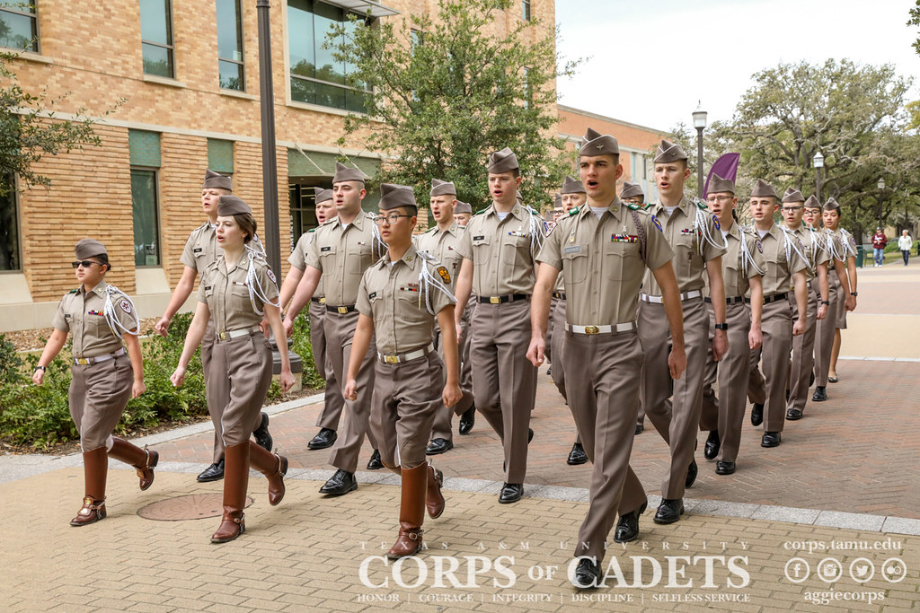 Image of Corps members marching on campus