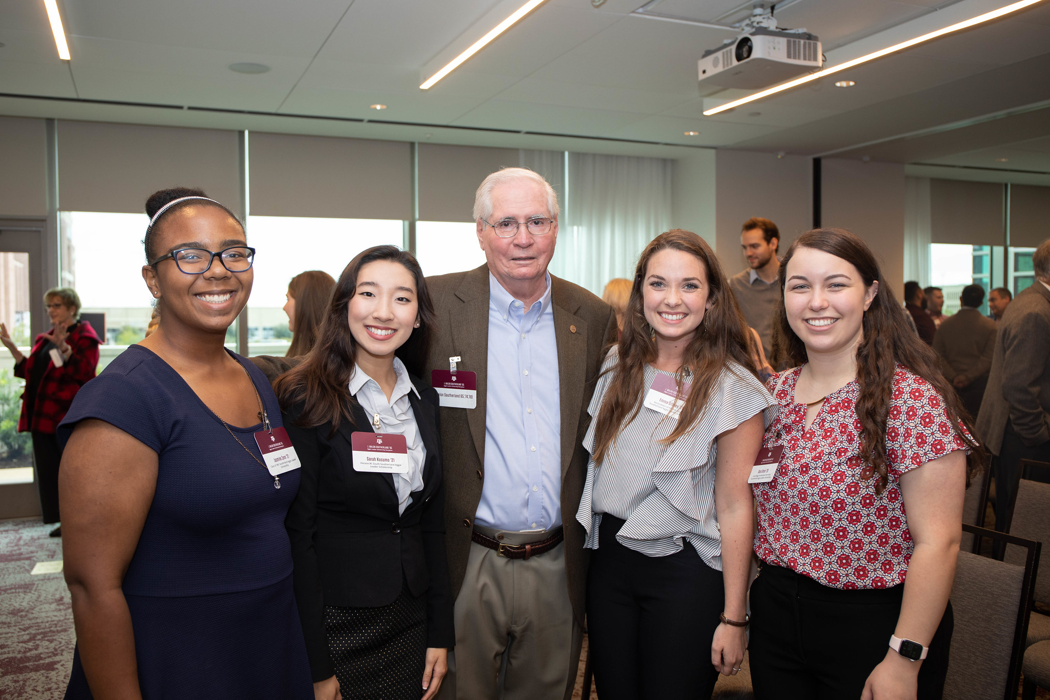 Image of a group of students posing with Dr. J. Malon Southerland