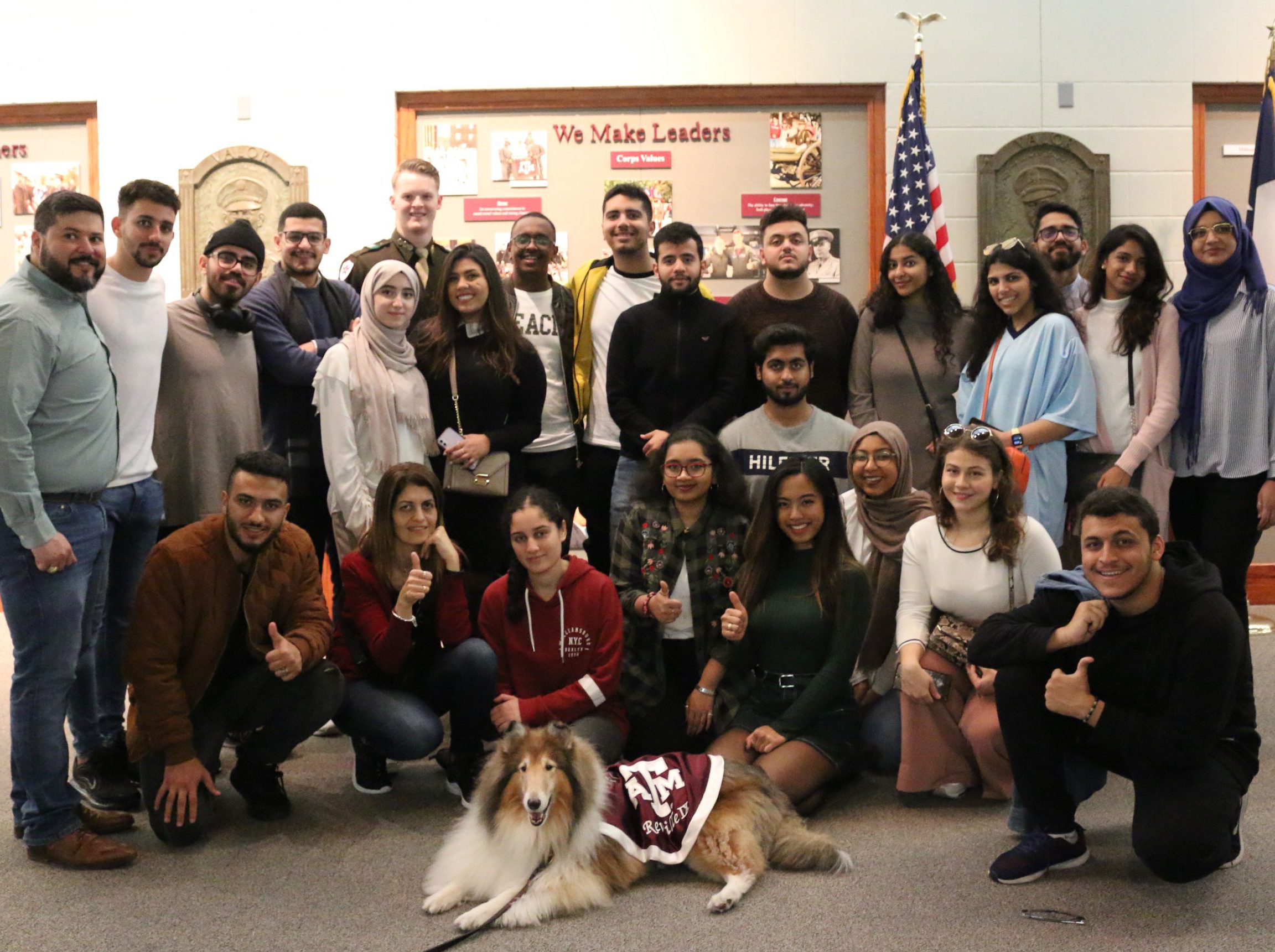SpringLeadershipExchange Group of diverse students posing with Reveille