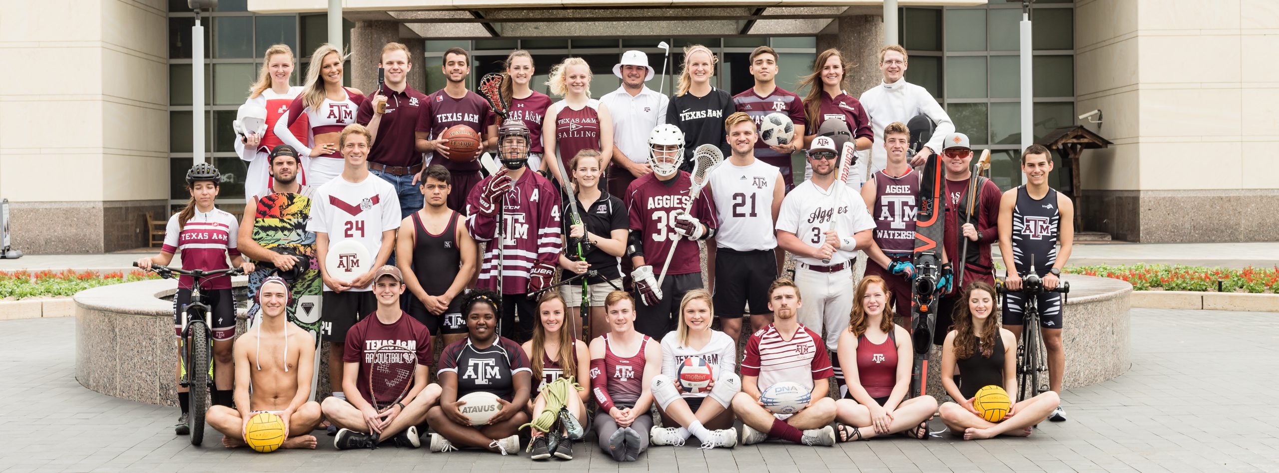 Image of students in various sports club uniforms