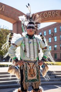 Photo of cadet George Hass ‘22 in his full handmade tribe regalia