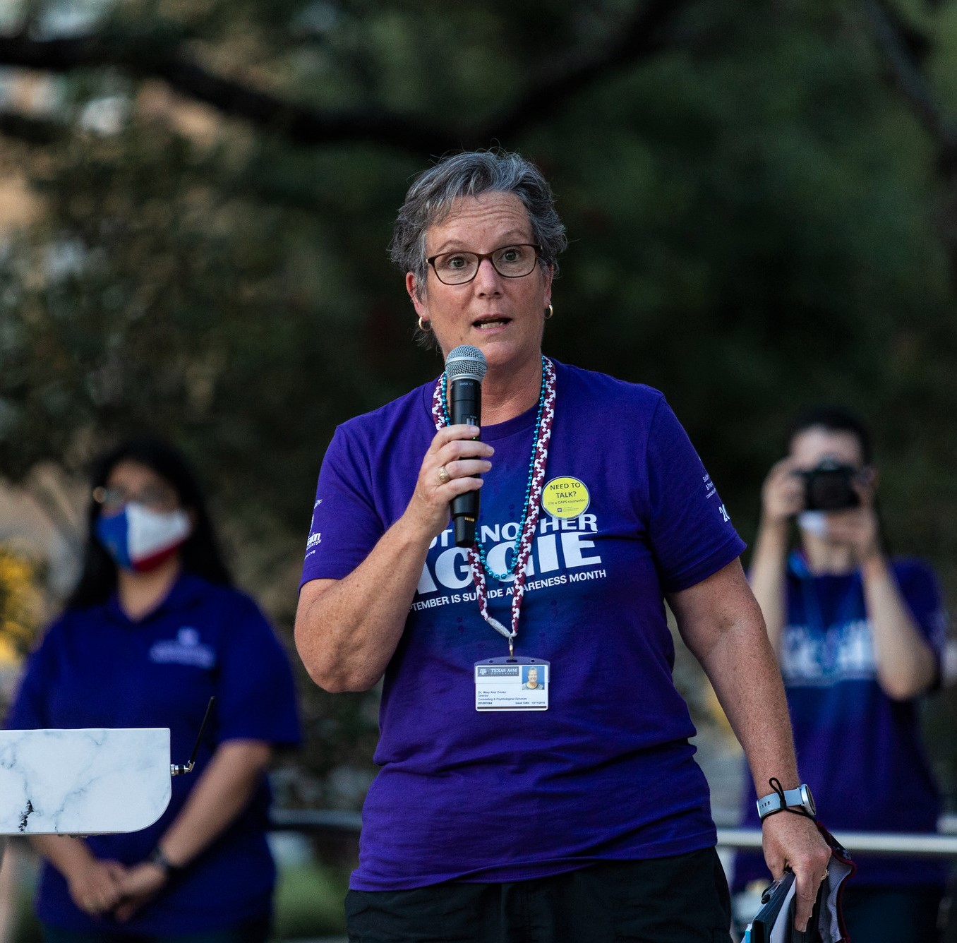 Dr. Mary Ann Covey speaks to participants at the kick-off event for Suicide Awareness Month at Rudder Plaza in September.