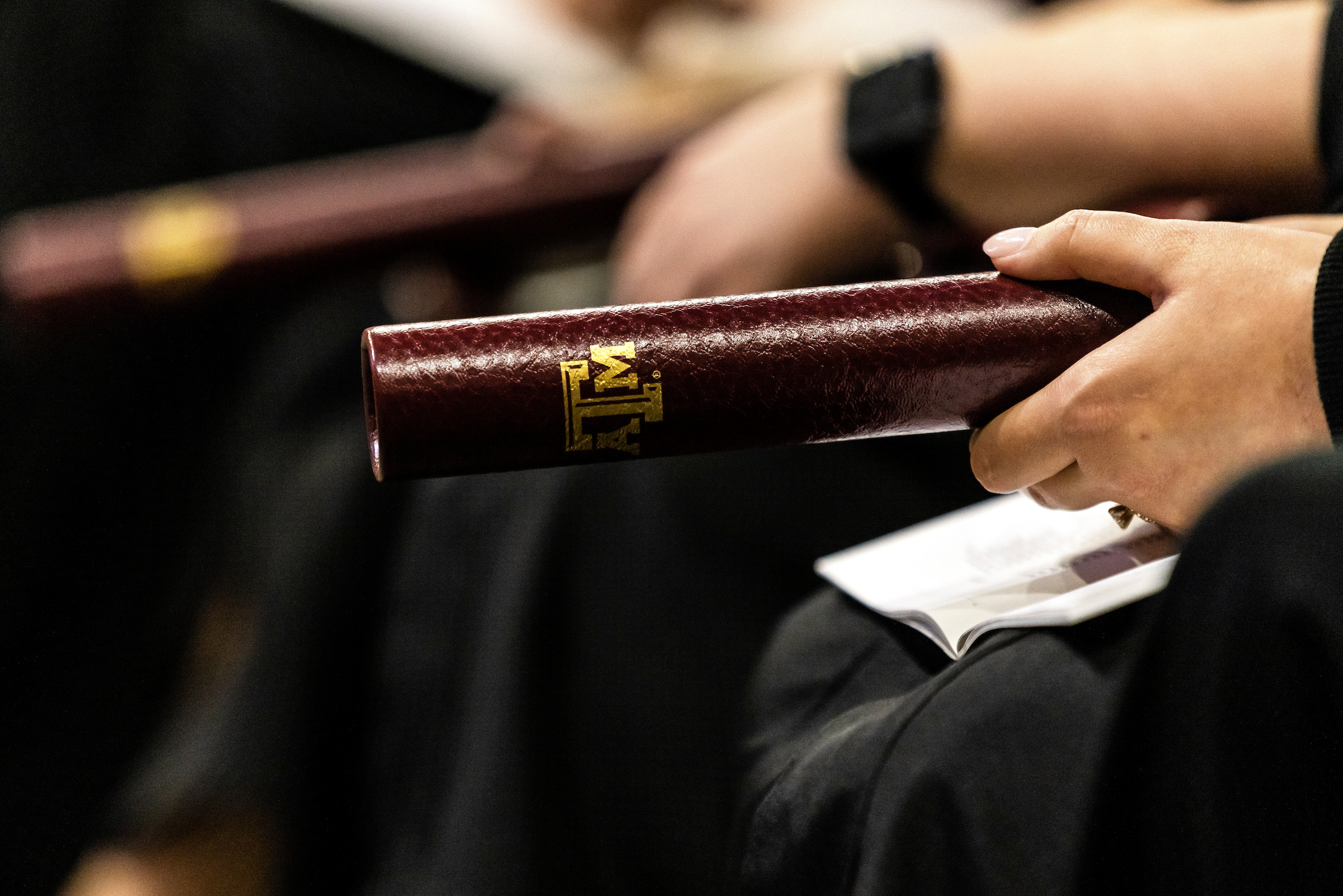 Image of a students hand with their Aggie ring on