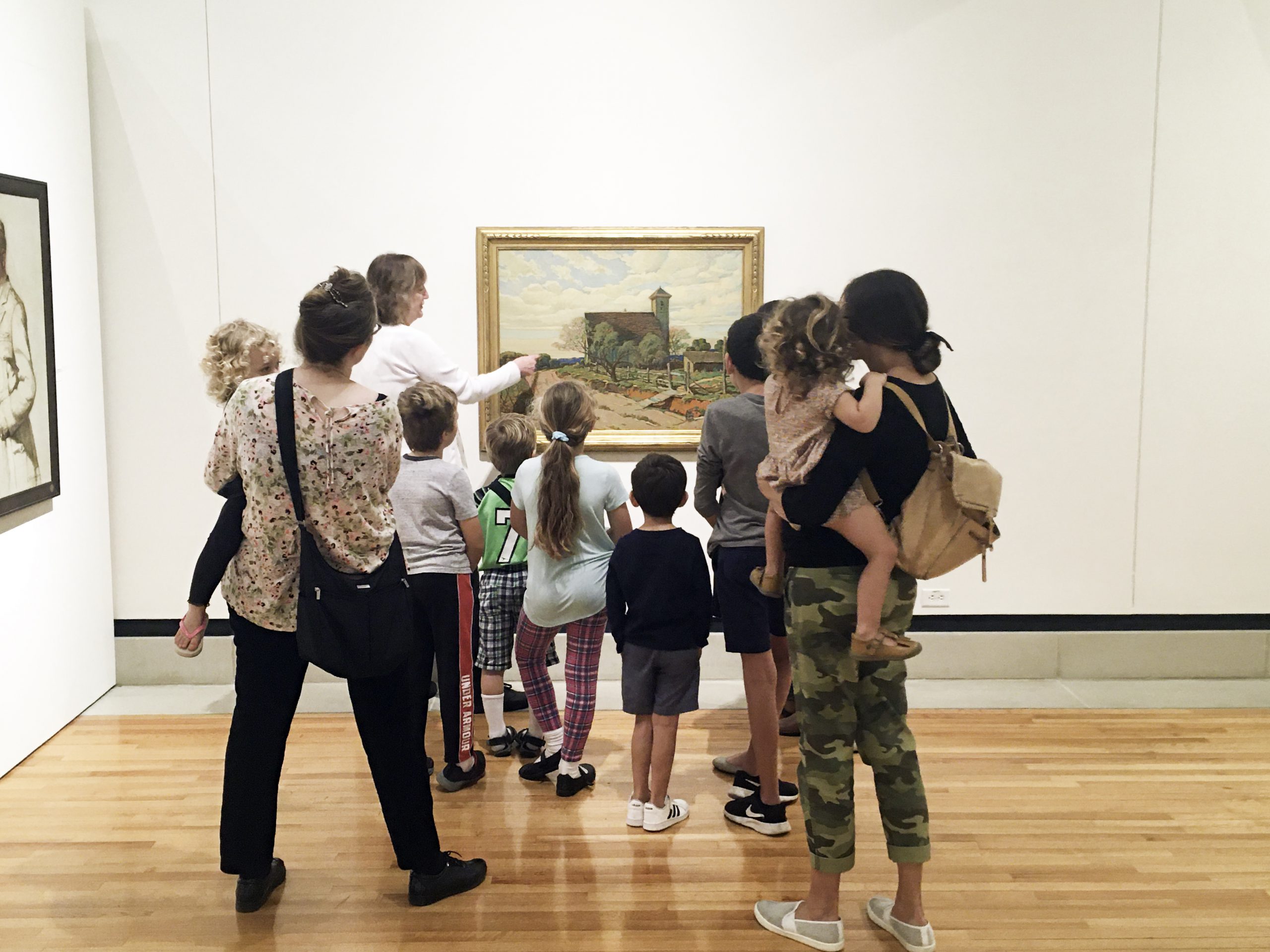 Group of young children learning about art at the University Art Galleries