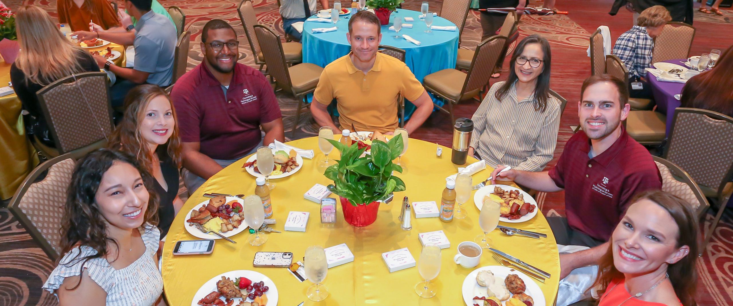 Photo of DSA staff sitting at a table at the DSA awards ceremony.