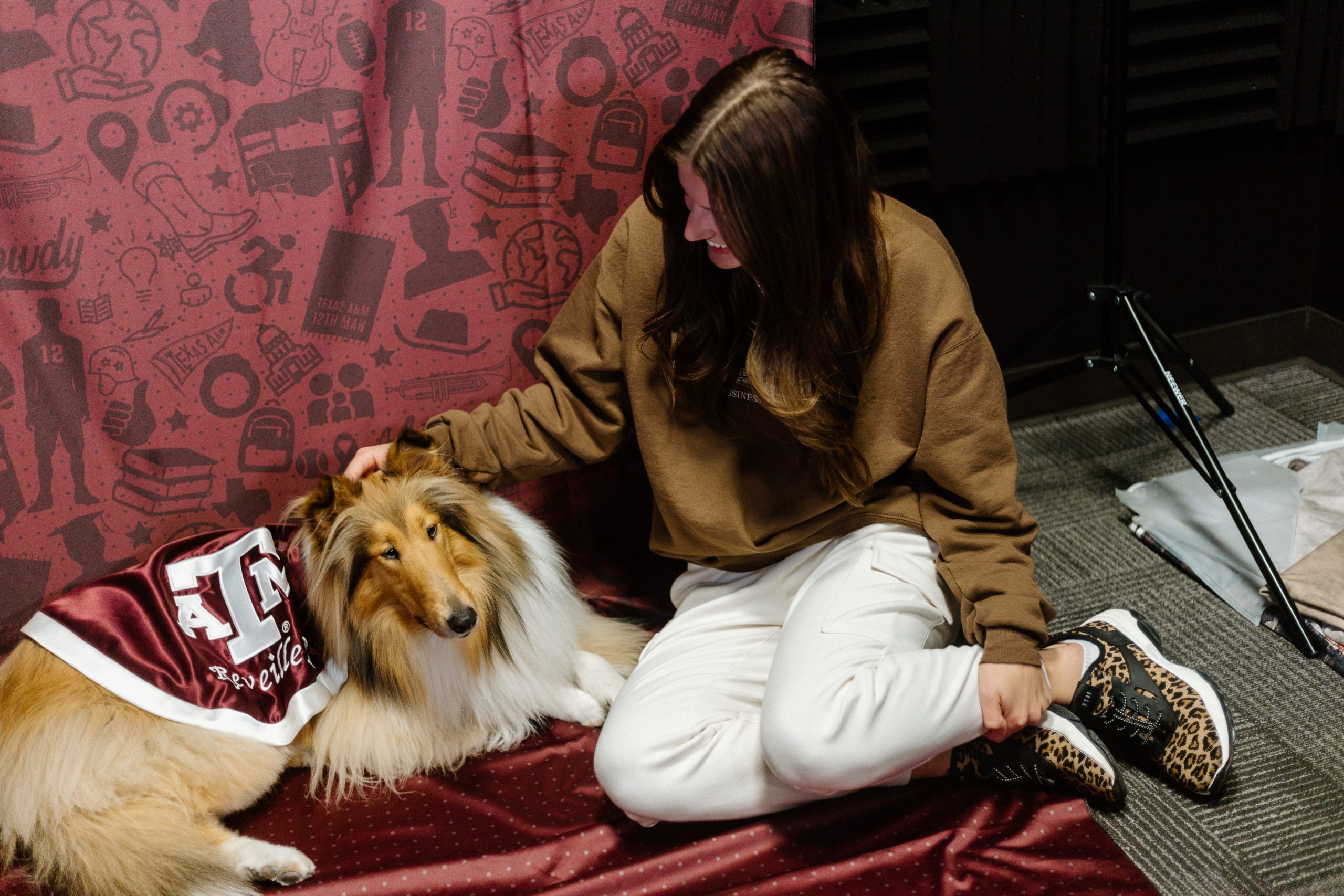 Student posing with Reveille