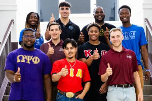 Members from different fraternities pose together