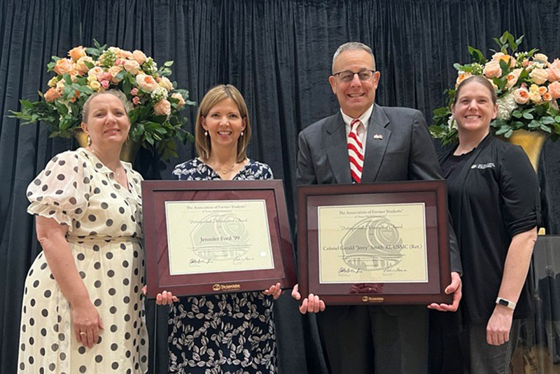 Dr. Stefanie Baker, Jennifer Ford, Col. Jerry Smith, and Dr. Kristen Harrell posing for a photo at the 2024 Distinguished Achievement Awards Ceremony