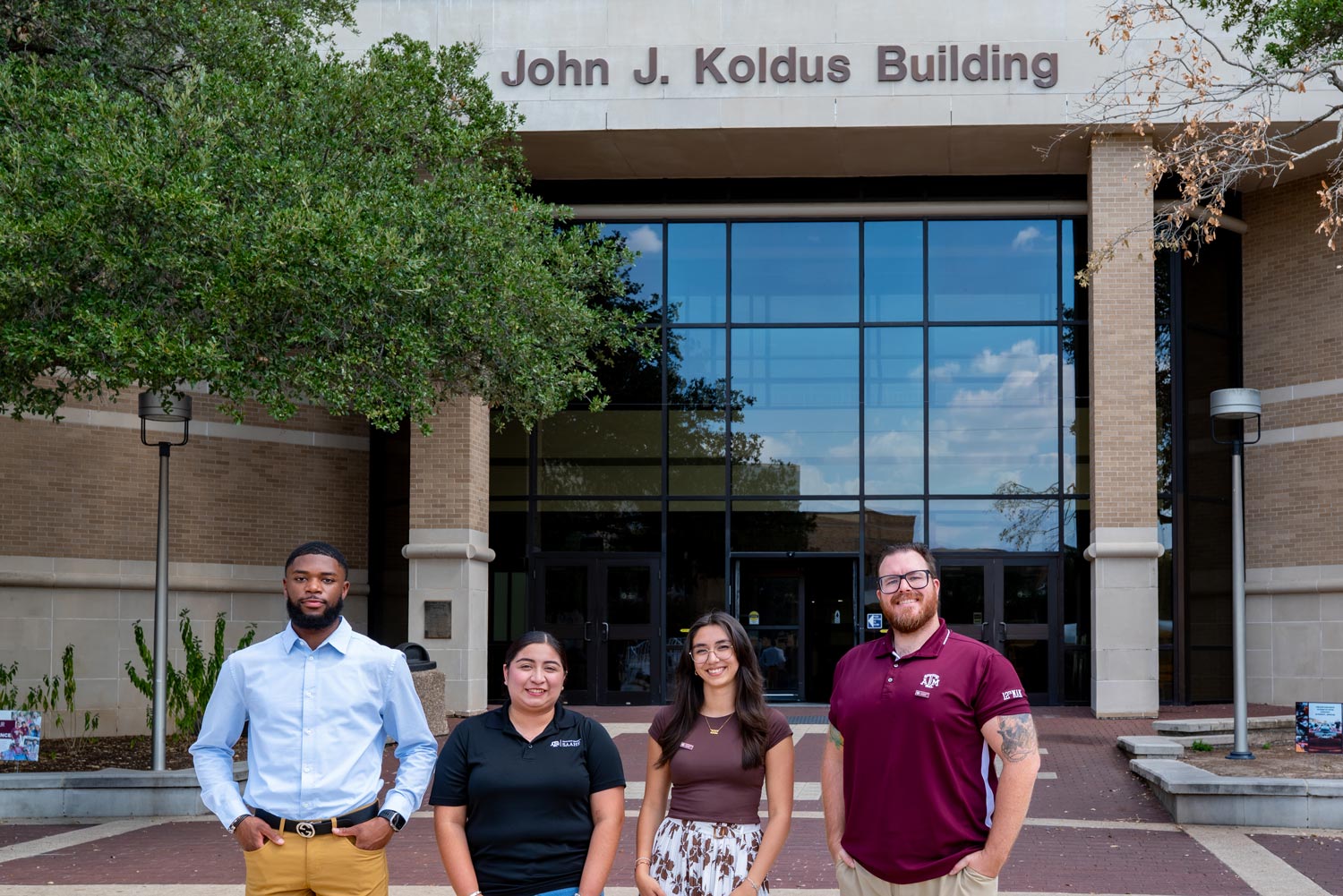 SAAHE students posing in front of the John J. Koldus building.
