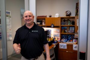 Roland Block outside of his office
