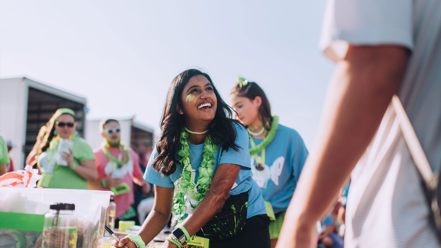 Student checking in other students for Fish Camp.