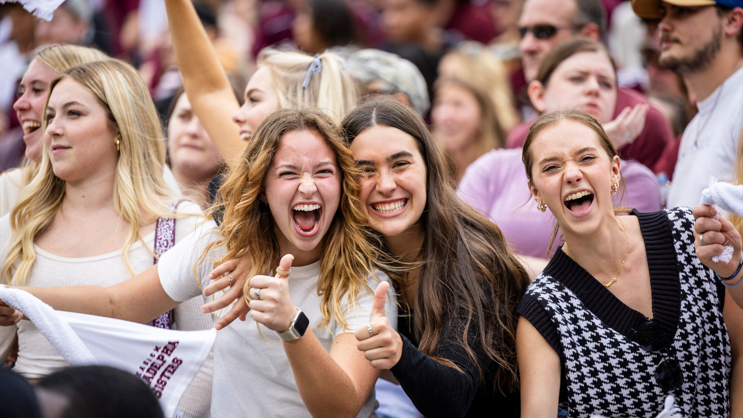 Crowd of students at an Aggie football game.