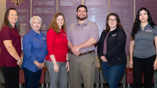 SAPAR staff members posing for a group photo.